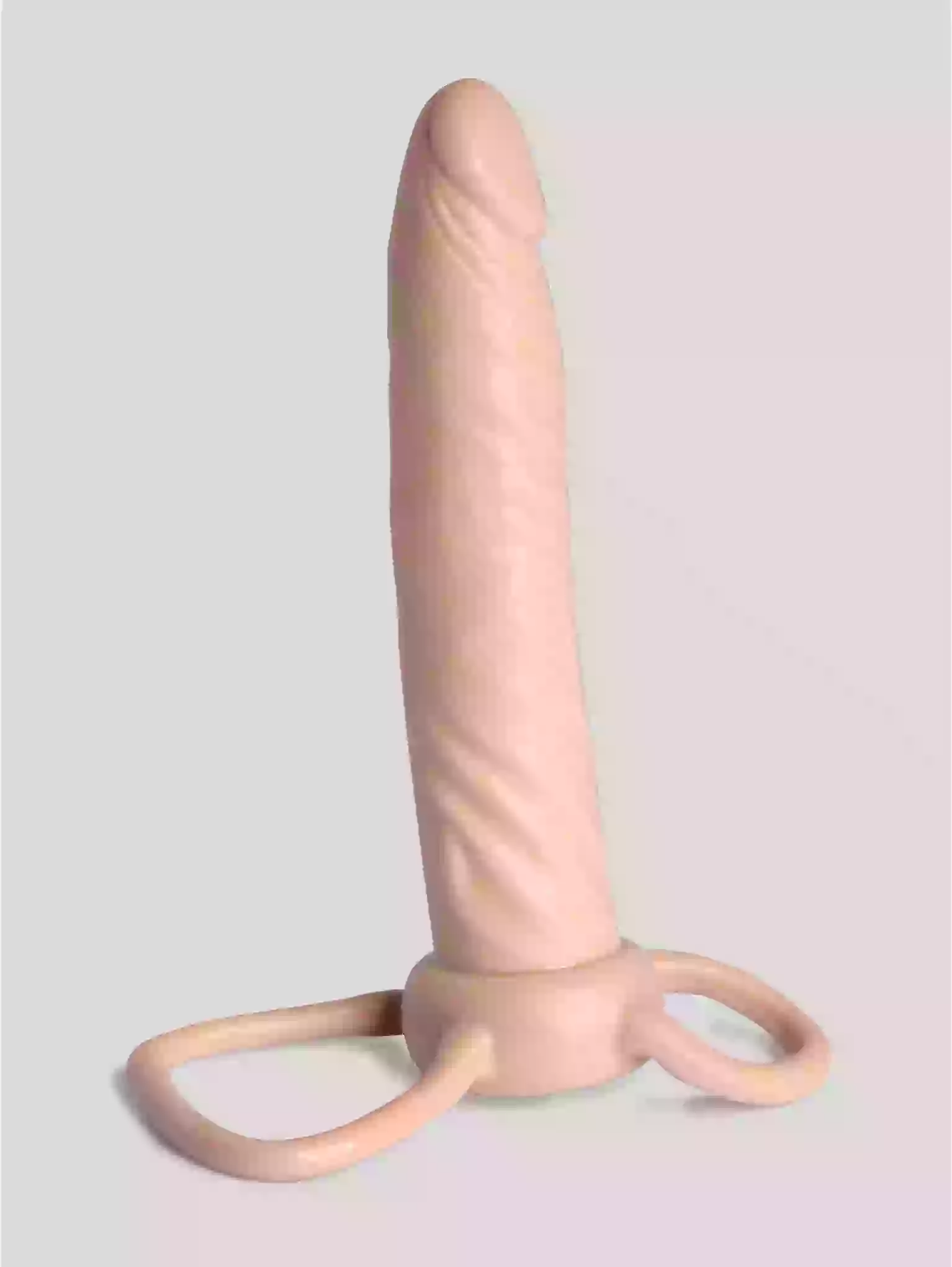 Pink silicone product on a light gray background