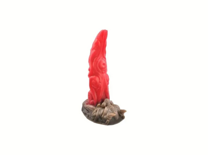 Red candle-like object on a stone base against a white background