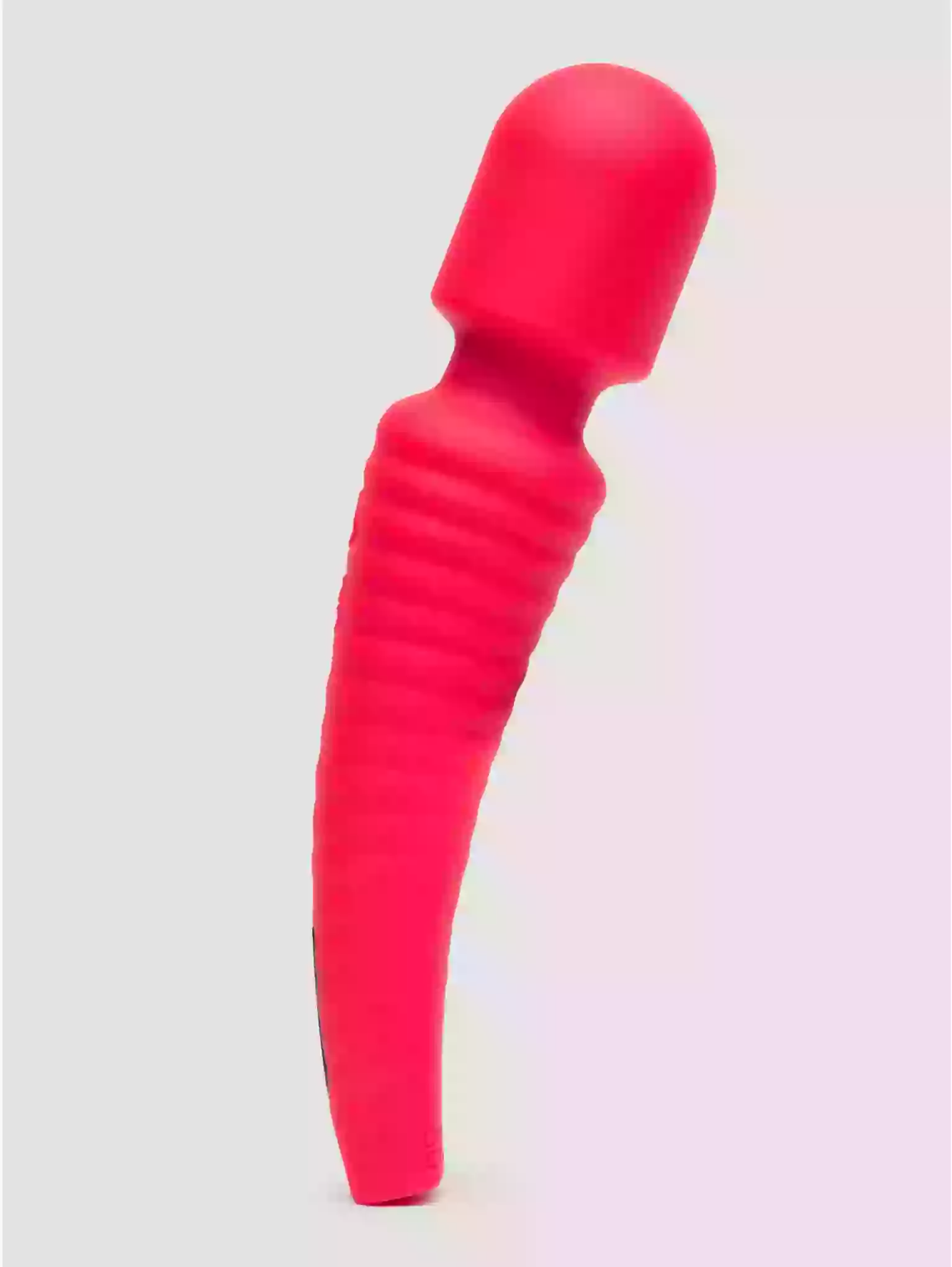 Red silicone butt plug on a gradient background