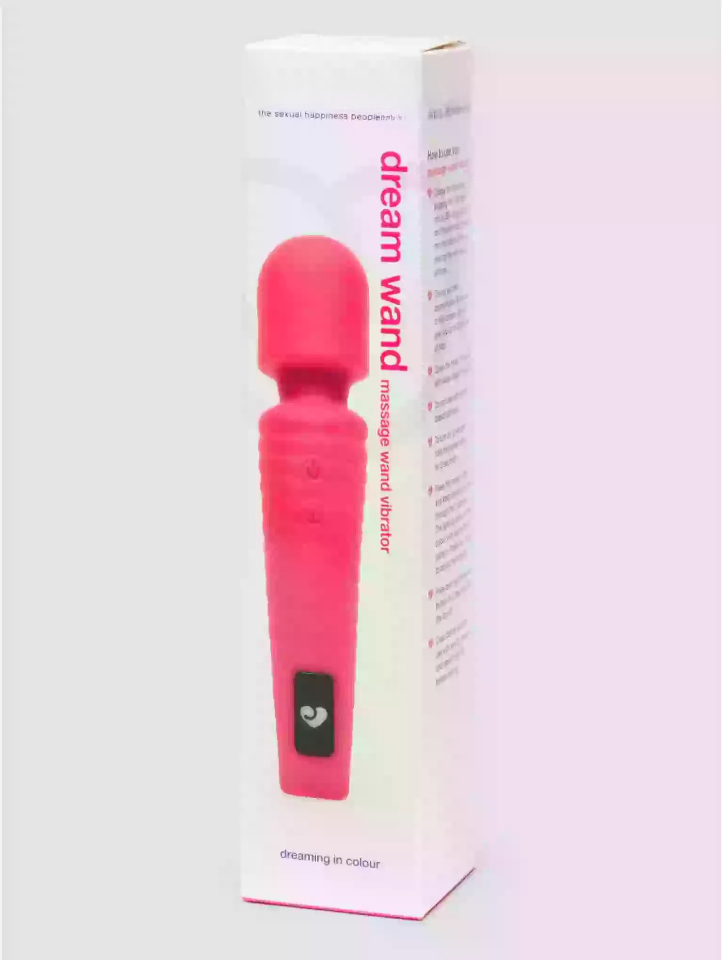 Pink 'dream wand' massage wand with packaging on a white background
