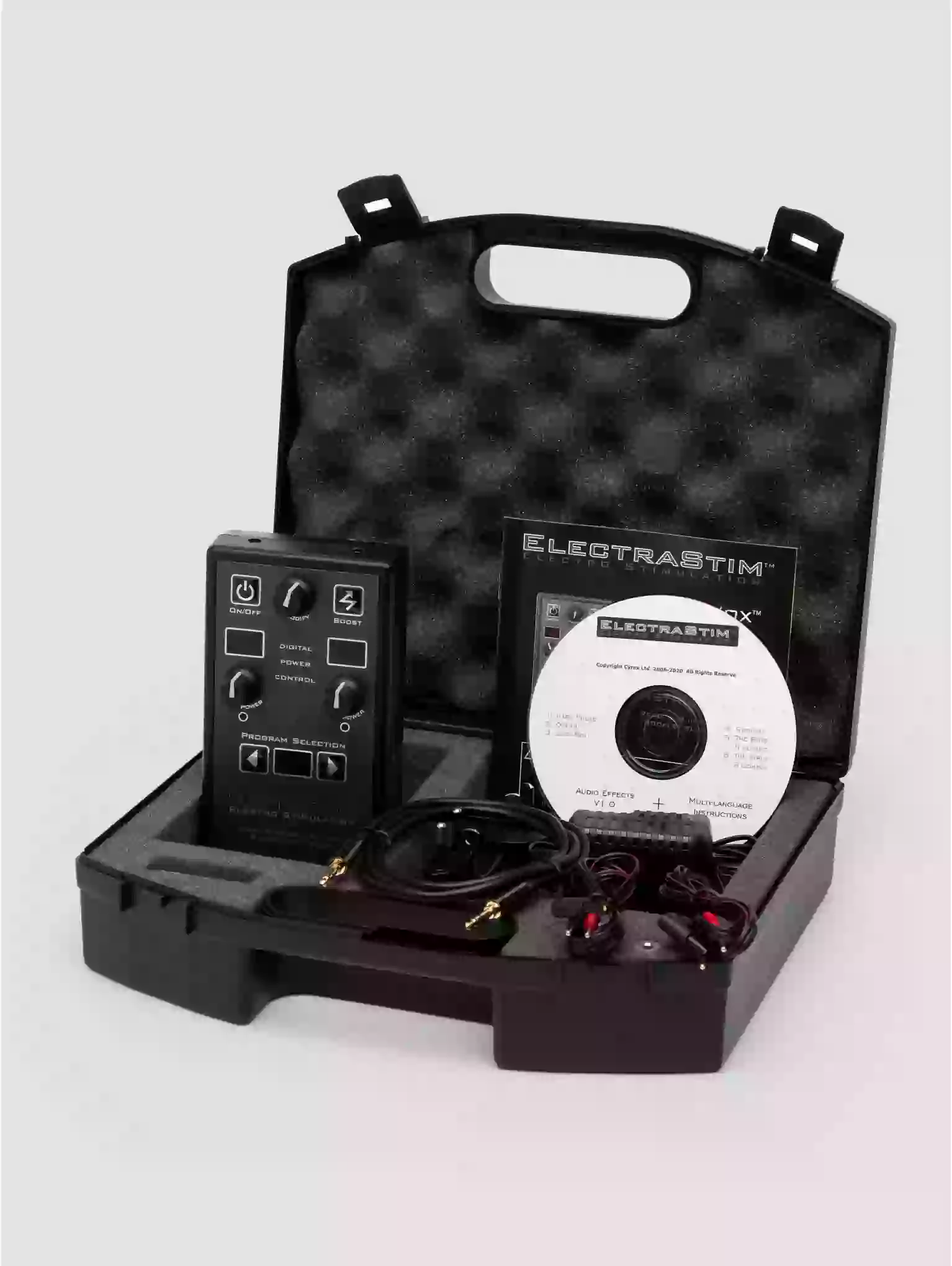 Electrostim product set with control panel, cable, and CD in a black carrying case on a white background.
