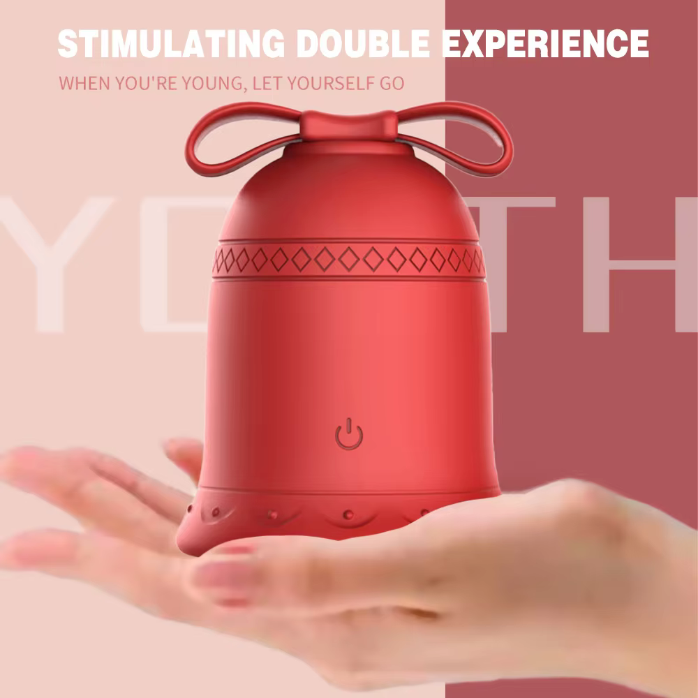 Red bell-shaped device held in a hand with motivational text on a pink background