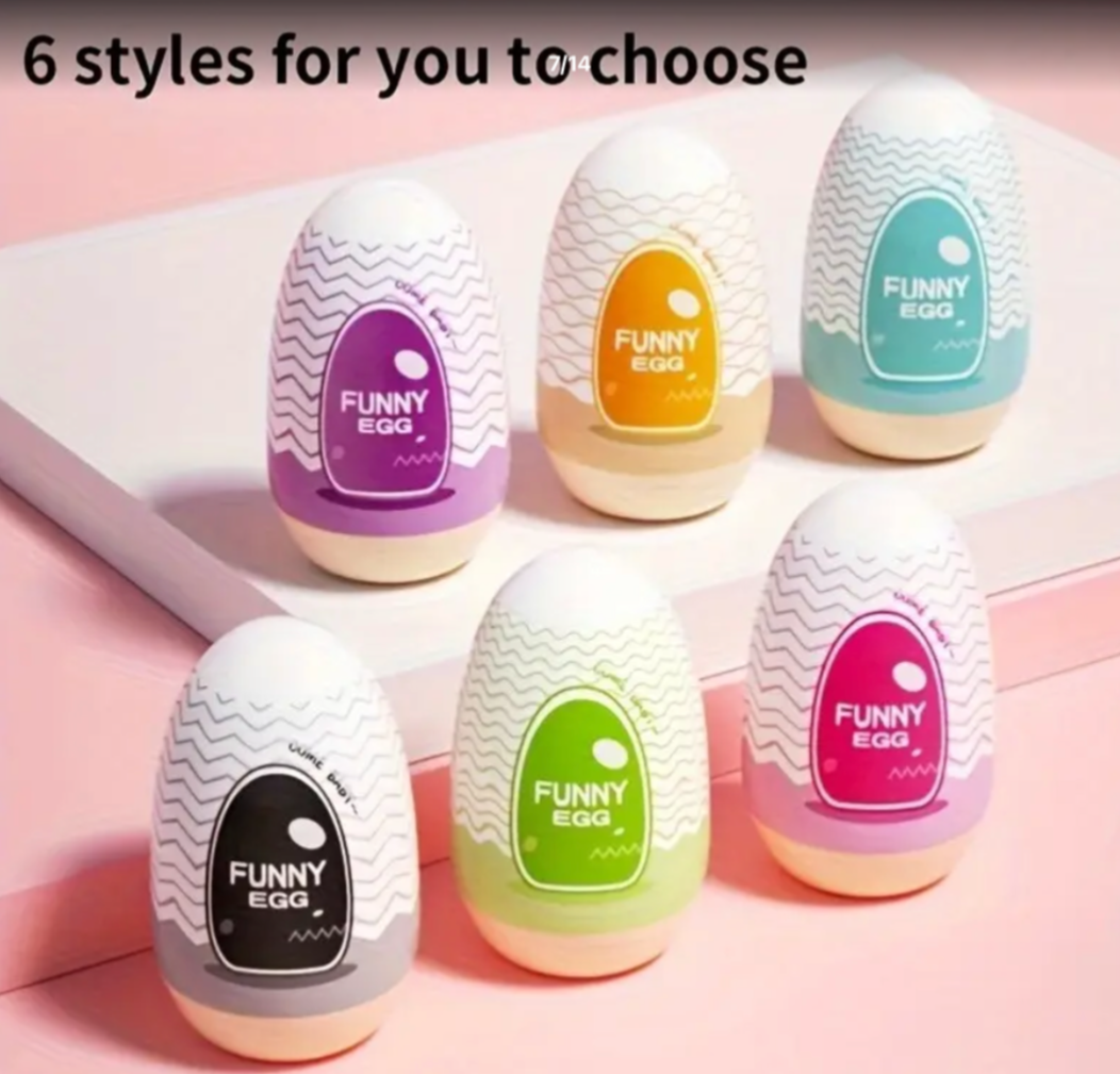 Six colorful 'Funny Egg' products with different colored labels on a pink background.