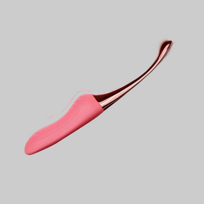 Pink lip balm with rose gold applicator on a light gray background