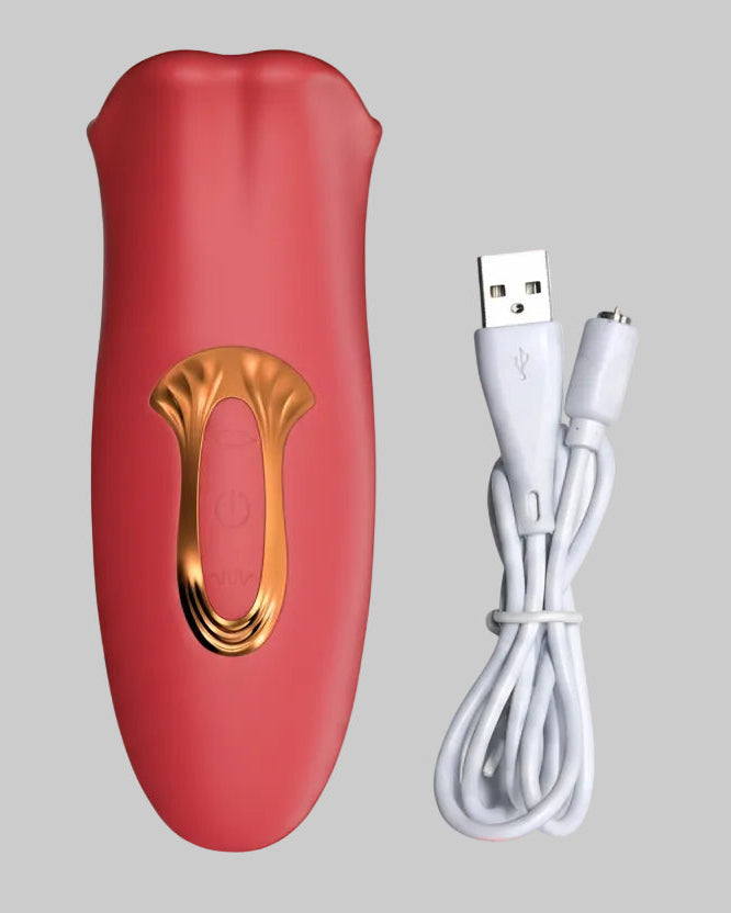 Red electronic device with gold accents and a white USB cable on a gray background