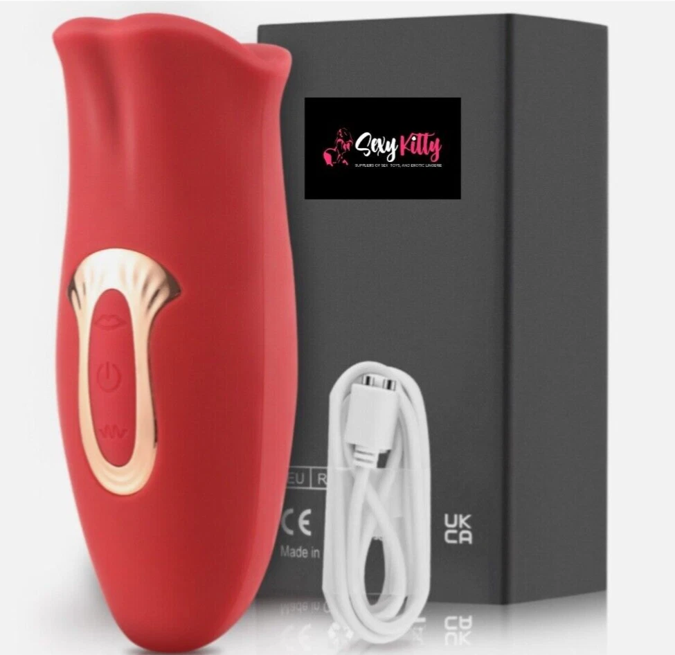Red electronic device with gold accents and a white cable on a black box featuring 'Savvy Kitty' branding.