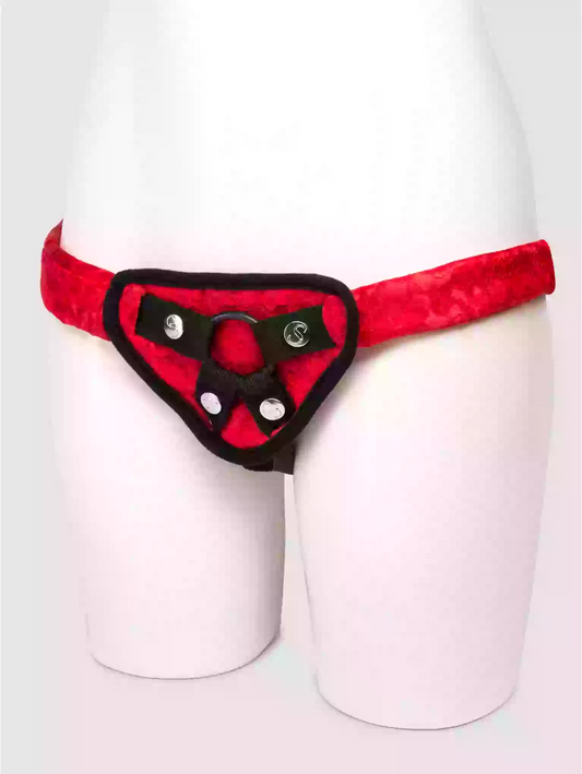 Red and black harness on a mannequin against a white background