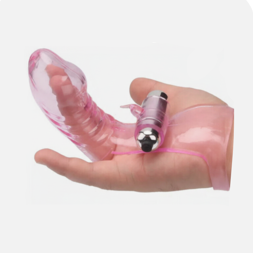 Pink plastic tool with a metallic component held in a hand on a white background