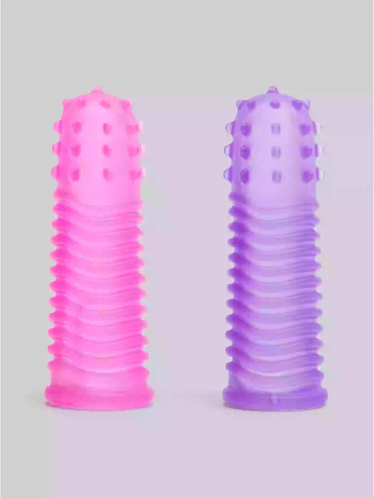 Two pink and purple textured cylindrical objects on a gray background