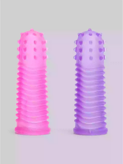 Two pink and purple textured cylindrical objects on a gray background