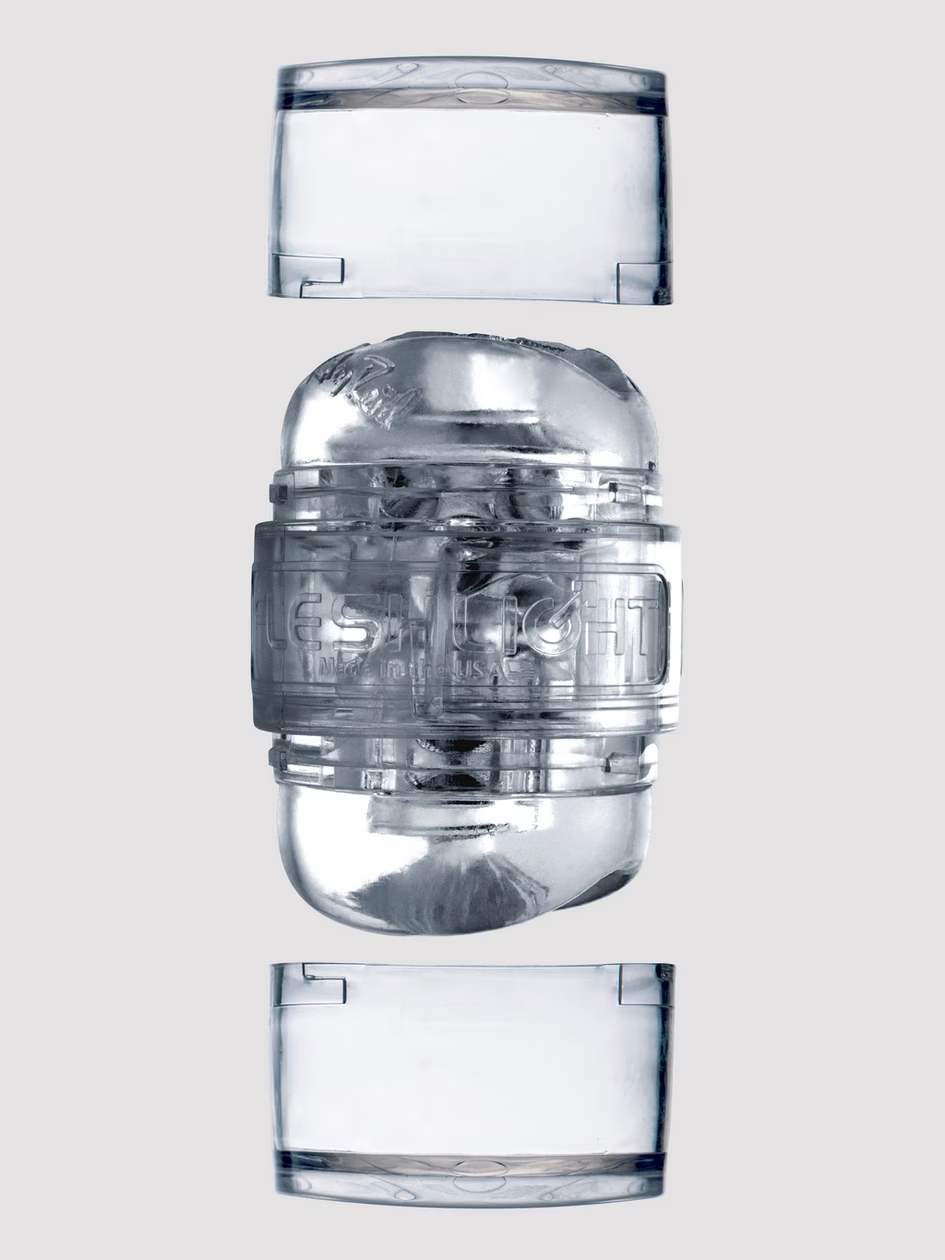 Clear glass water filter with three components on a light gray background