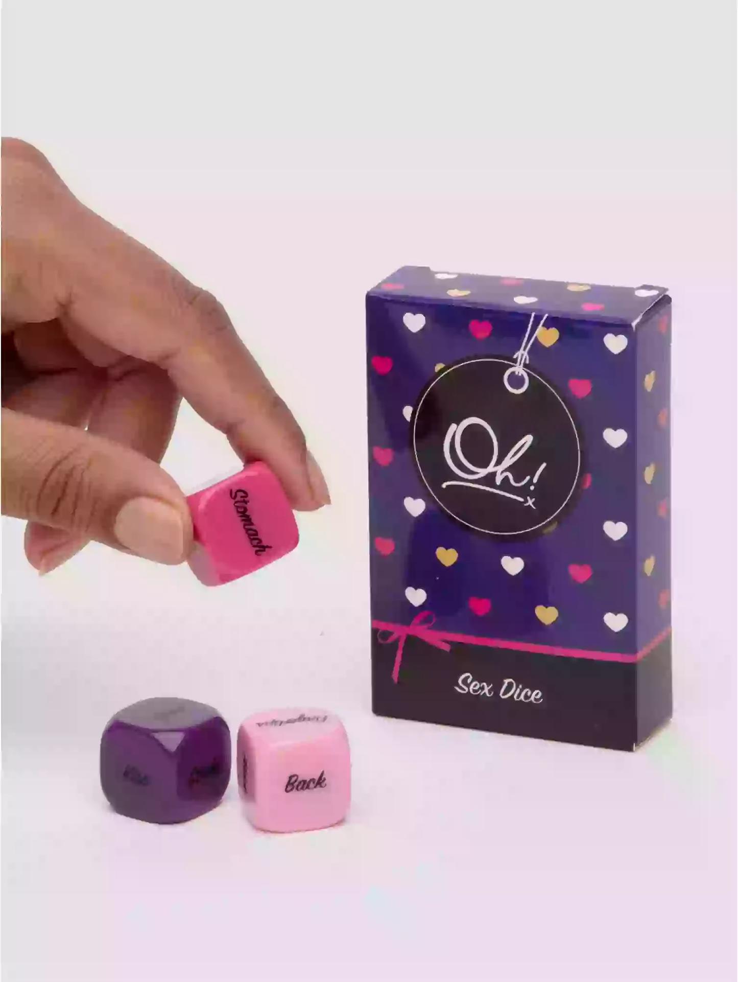 Sex dice with 'Lovehoney' packaging on a white background