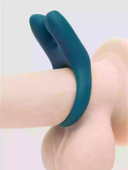 Teal silicone ring on a neutral background
