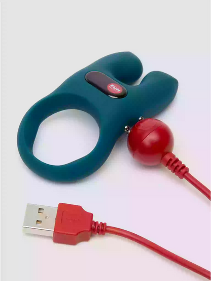 Teal device with red cable and USB connector on a white background