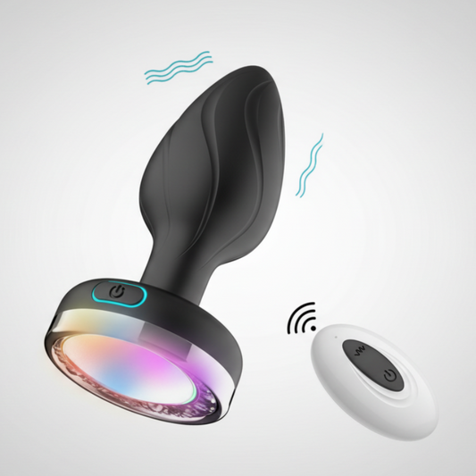 Sexual product with remote control on a light gray background