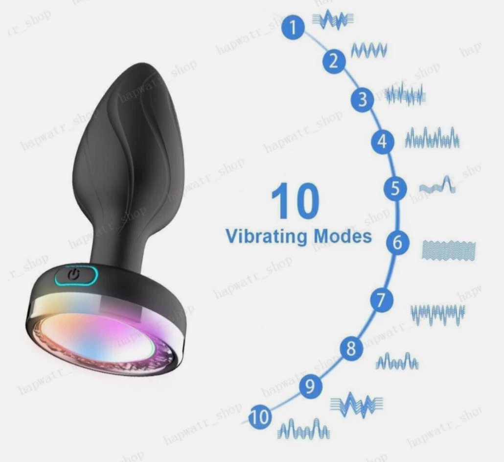 Black and purple electronic device with 10 vibrating mode indicators on a white background