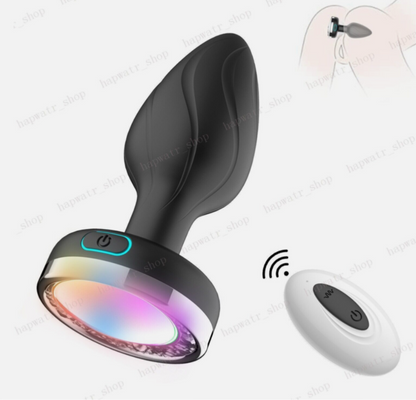 Black and white electronic device with colorful light on a white background