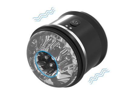 Black and silver device with a circular component on a white background