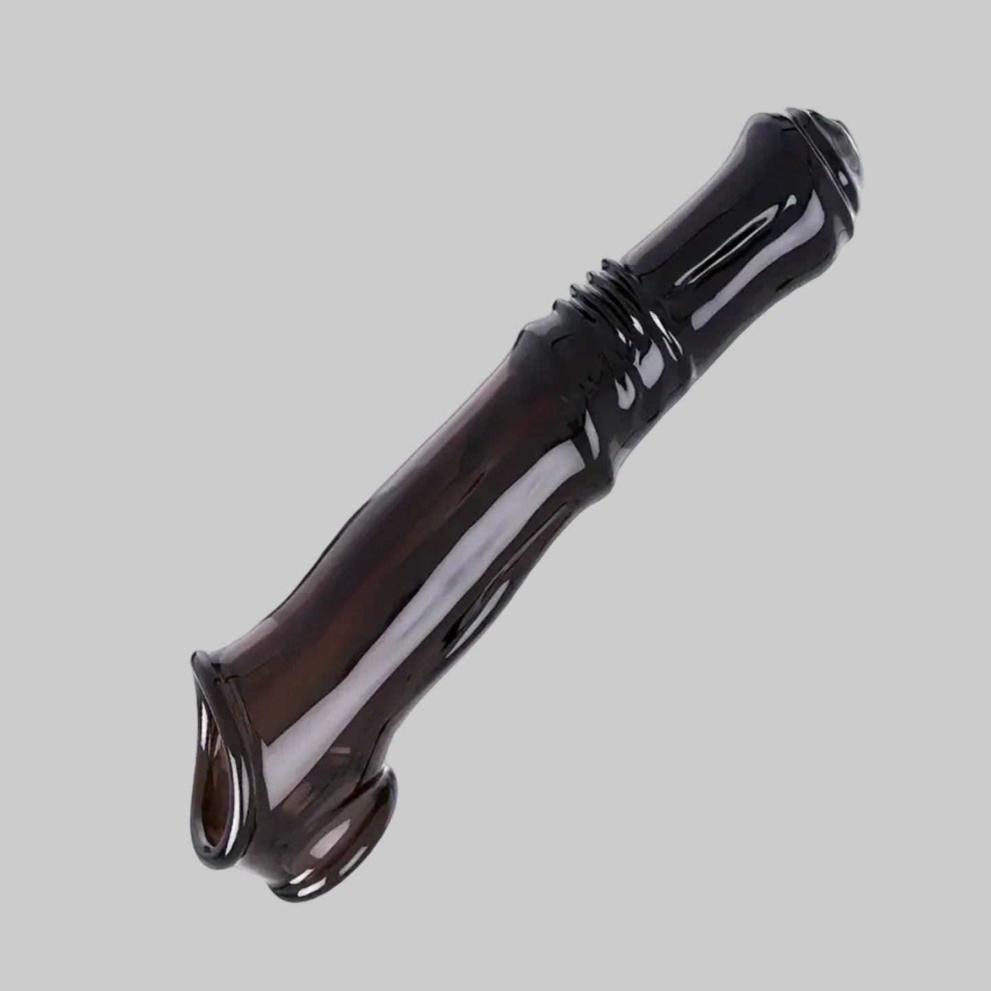 Black hair straightener on a gray background