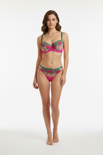 Woman wearing a floral bikini set on a white background