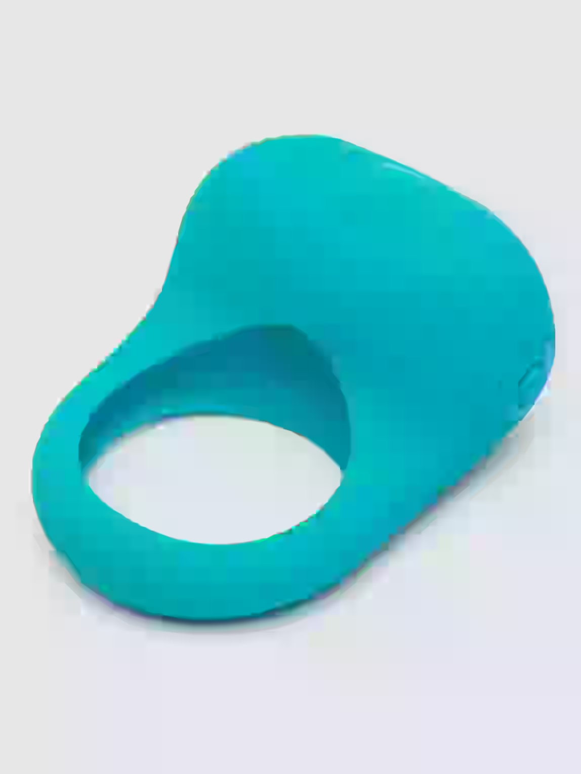 Turquoise silicone ring on a light gray background