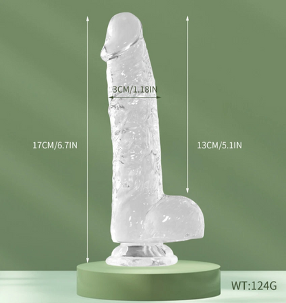 Clear silicone product with measurements on a green background