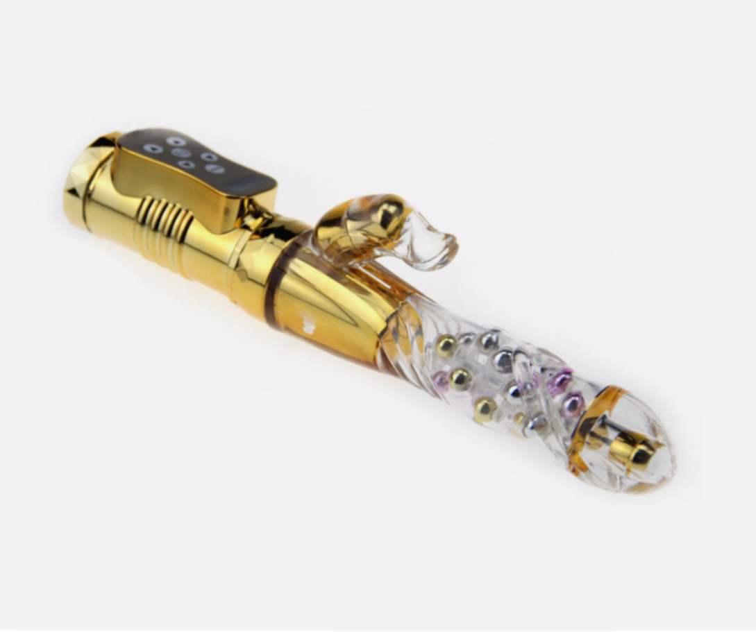 Gold and clear electronic device on a white background