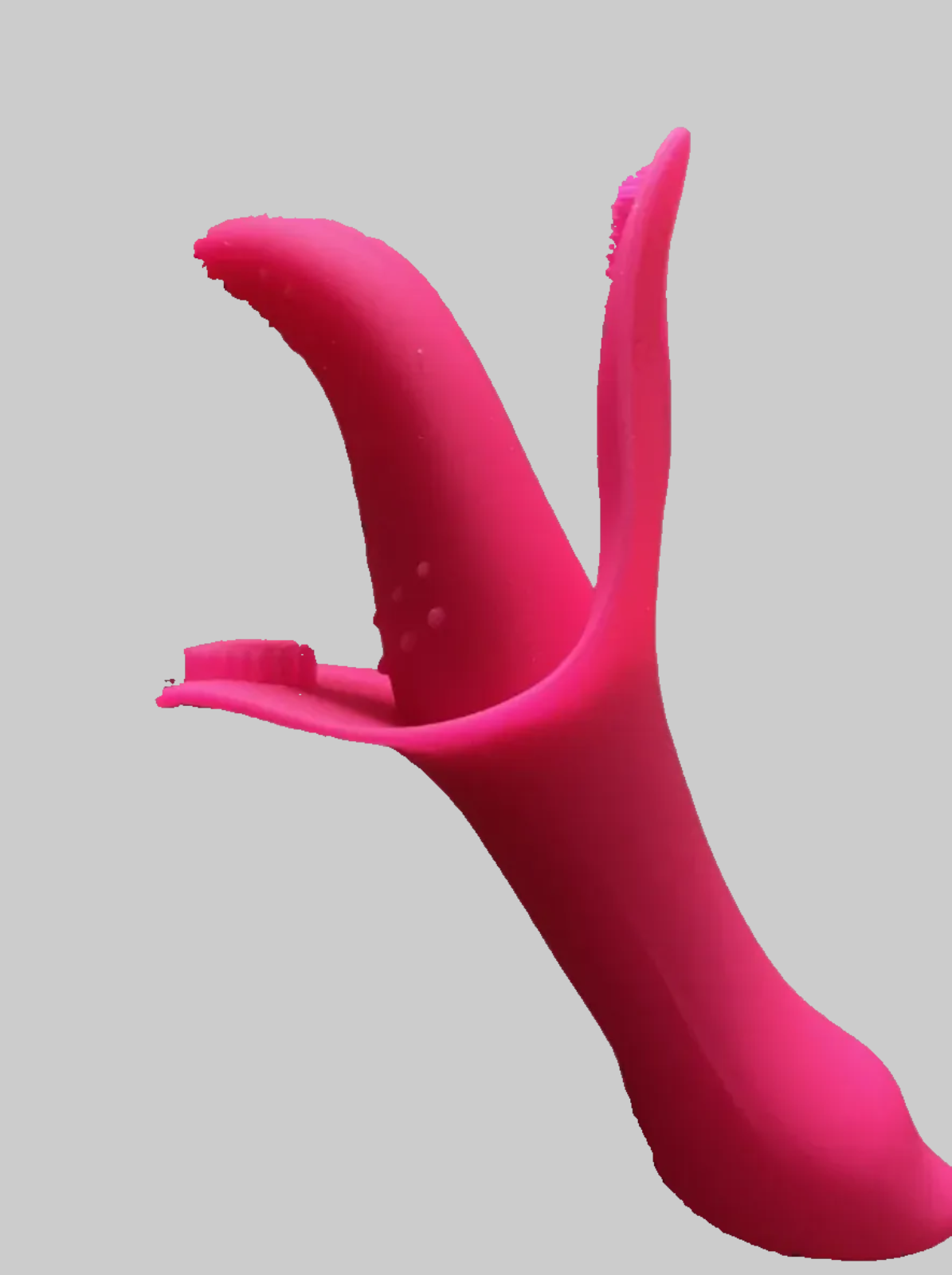 Pink silicone product on a gray background
