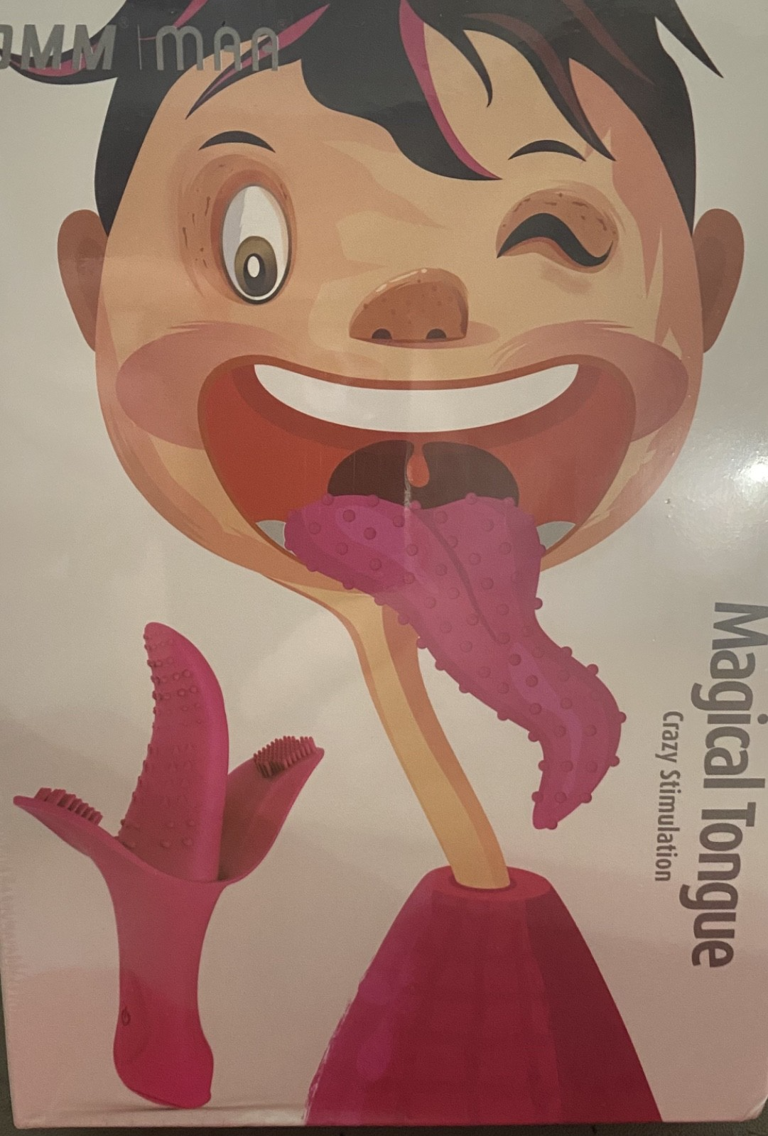 Product packaging with cartoon illustration of a face and tongue, labeled 'Magical Tongue'.