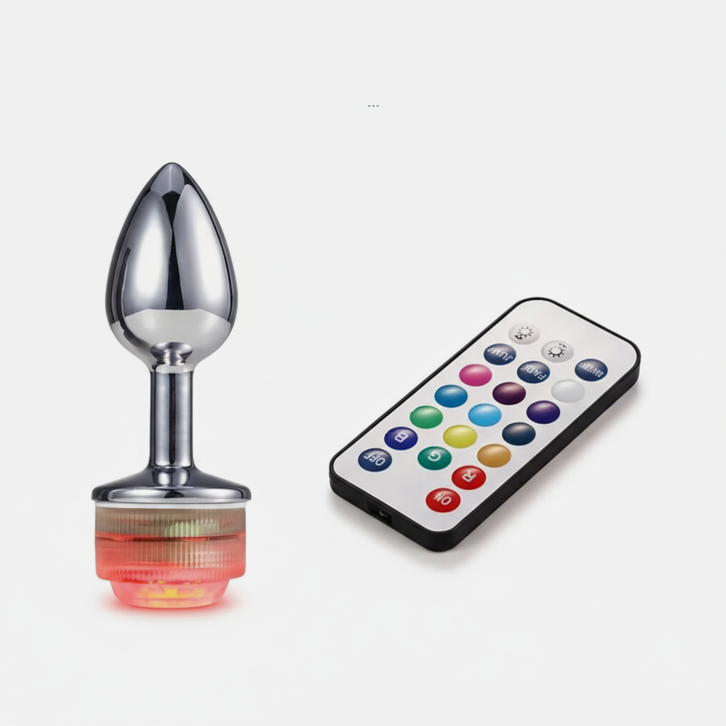 Sexual product with remote control on a white background