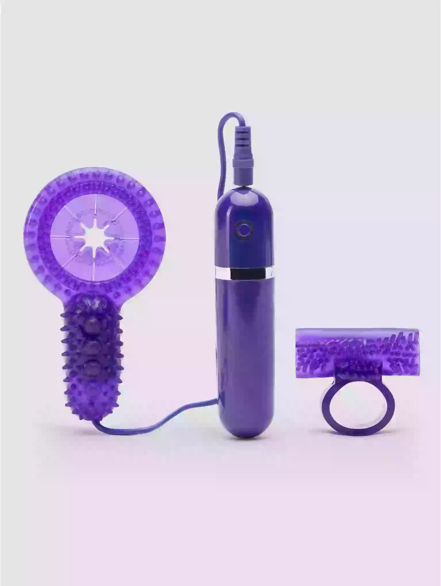 Purple handheld device with attachments on a light purple background