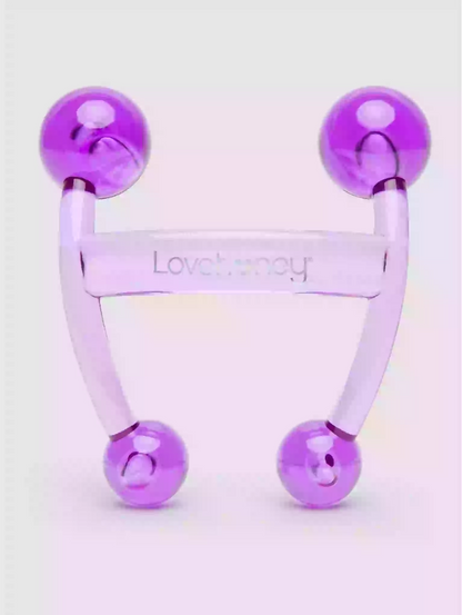 Purple and clear device with 'Lovehoney' branding on a light background