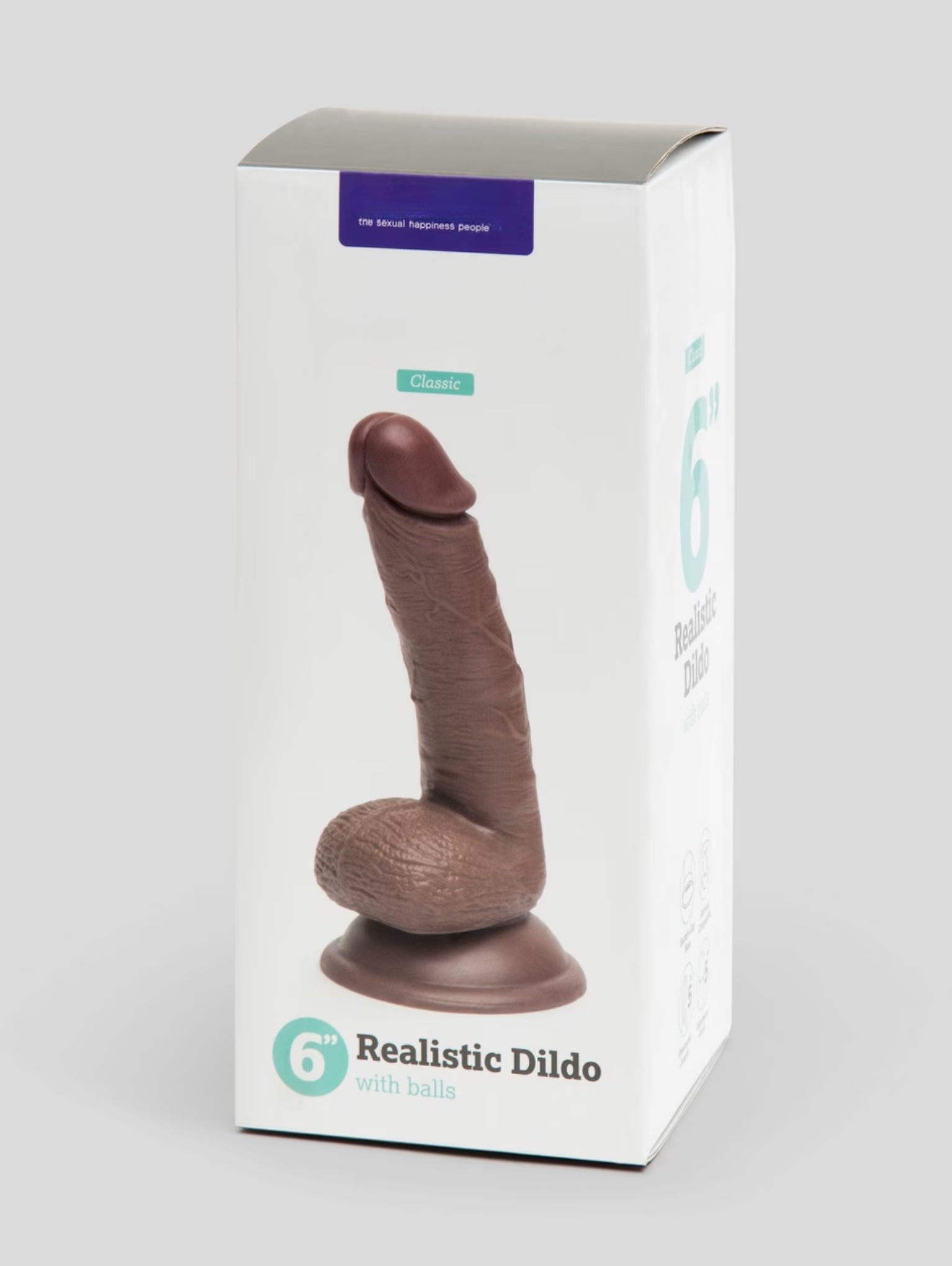 Boxed realistic dildo with visible branding on a white background