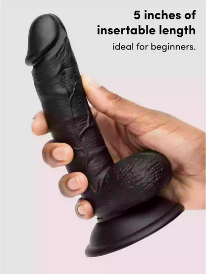 Black silicone product held in a hand with text about insertable length on a light gray background