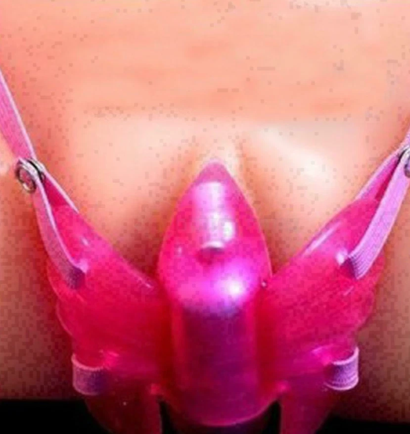 Close-up of a pink plastic device on a person's chest.