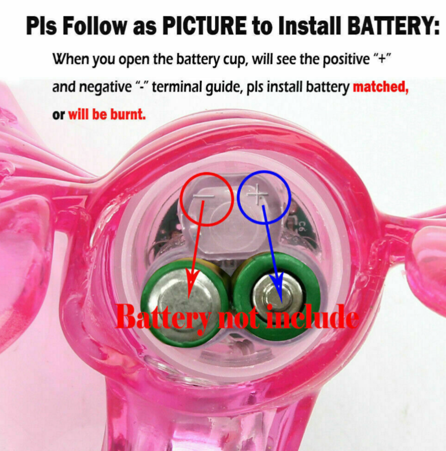 Pink toy with battery compartment and text instructions on how to install batteries.