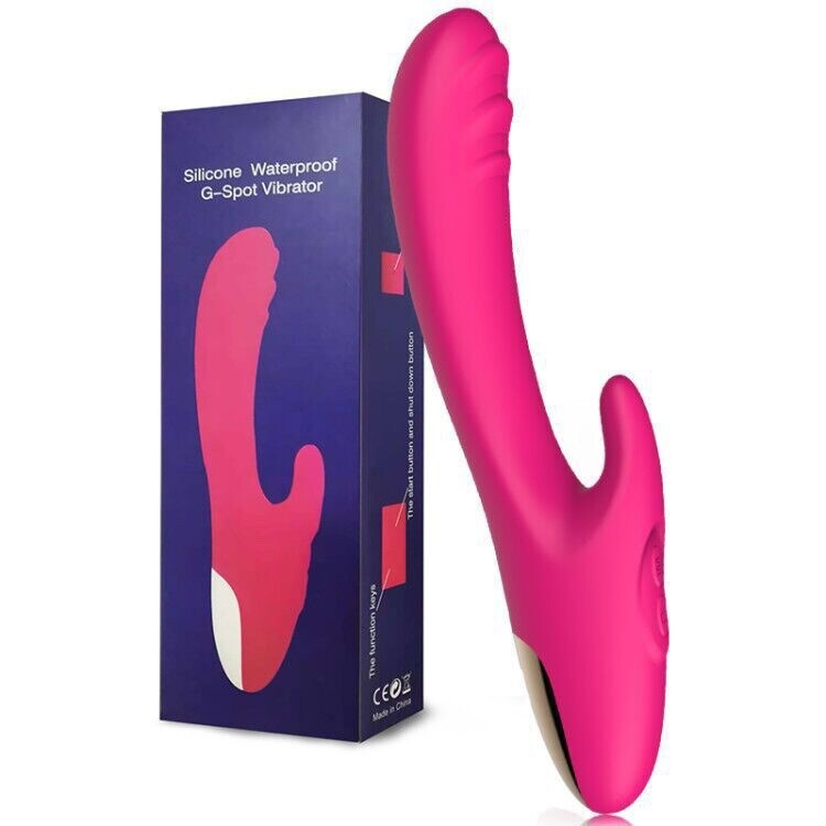 Pink G-Spot vibrator with packaging on a white background