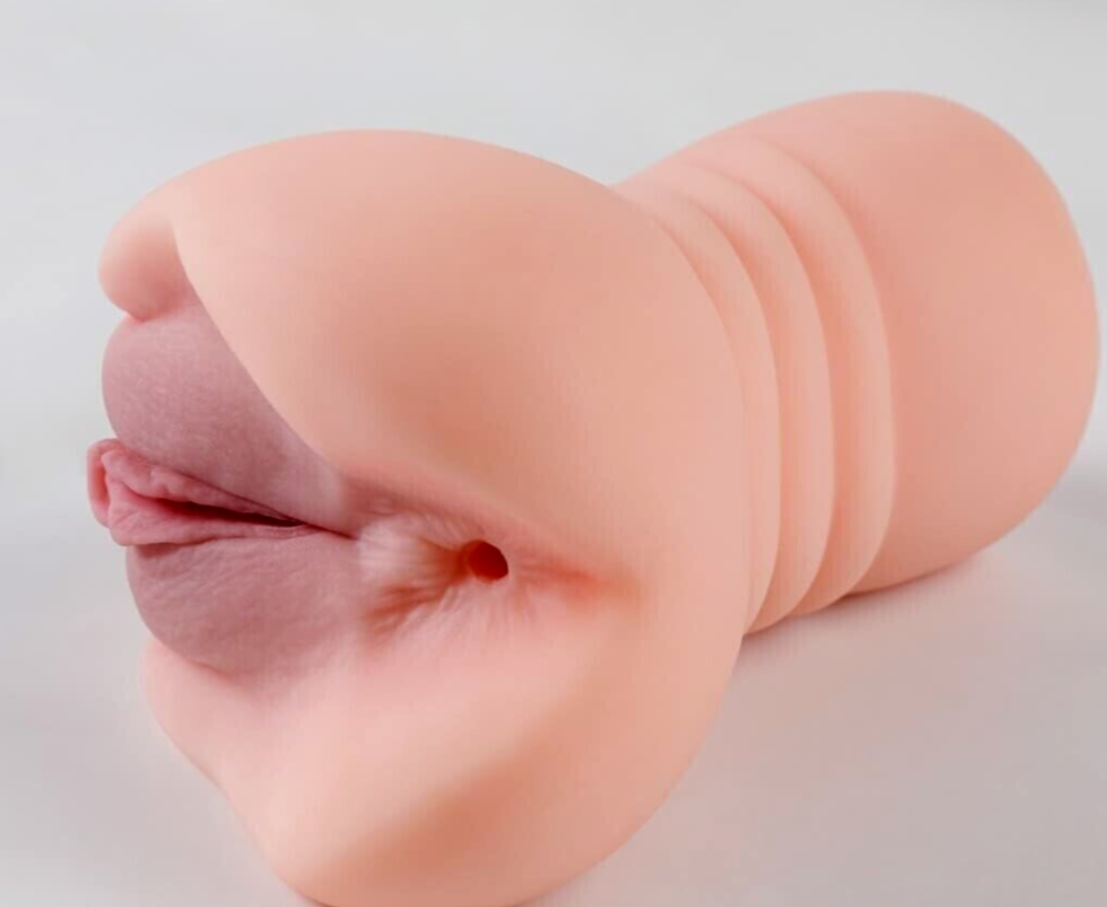 Realistic silicone mold of a human penis on a light gray background