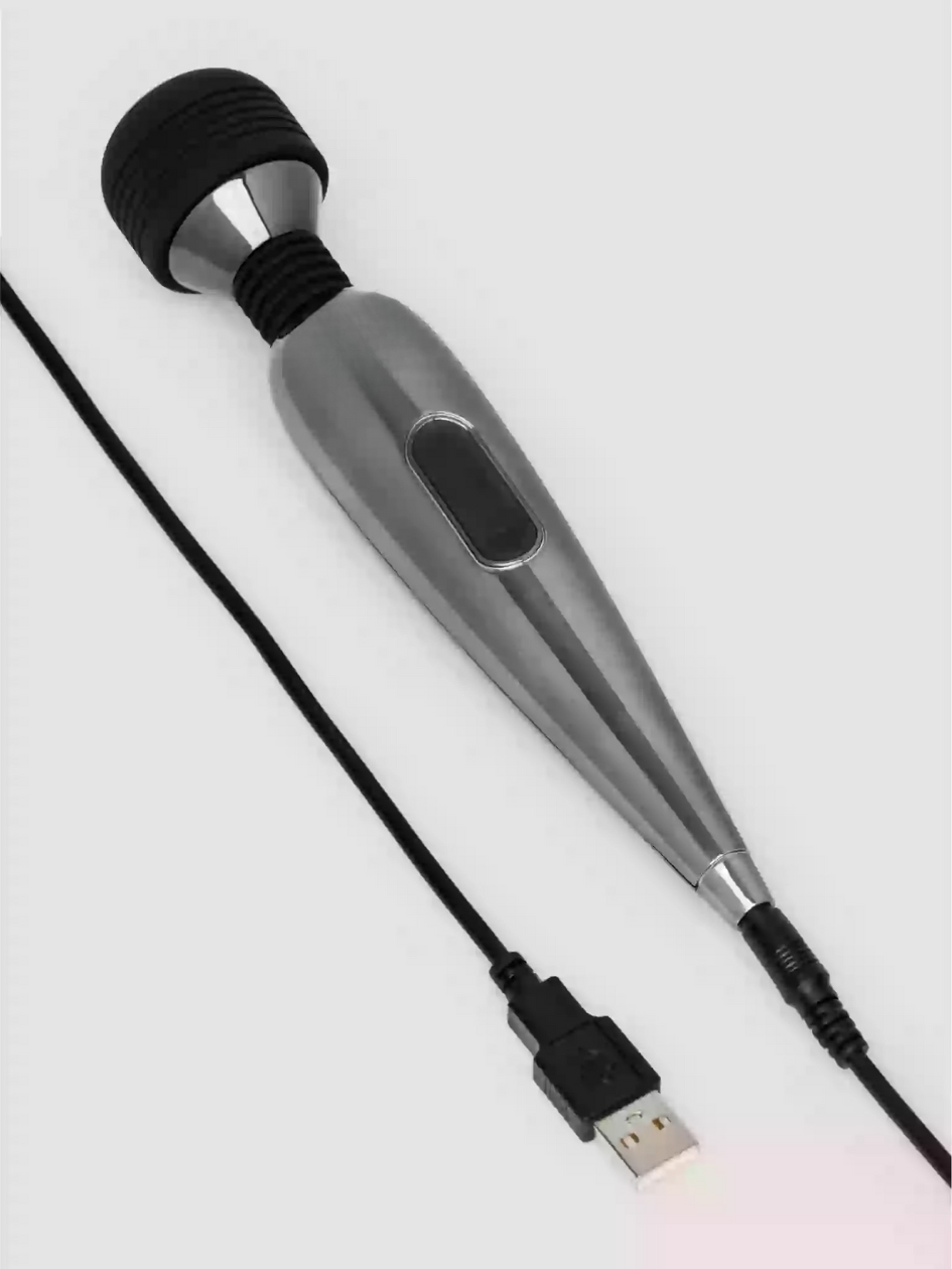 Silver handheld device with USB cable on a white background