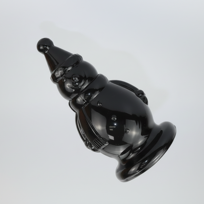 Black ceramic gnome figurine on a light gray background