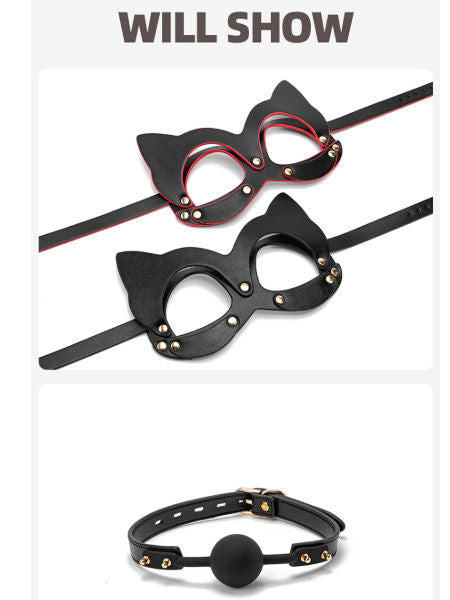 Black cat-eye mask with red accents and a black leather collar on a white background.