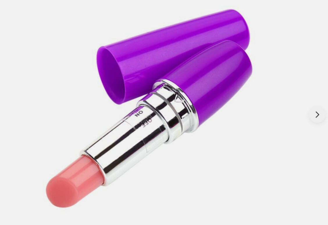 Pink lipstick with a purple case on a white background
