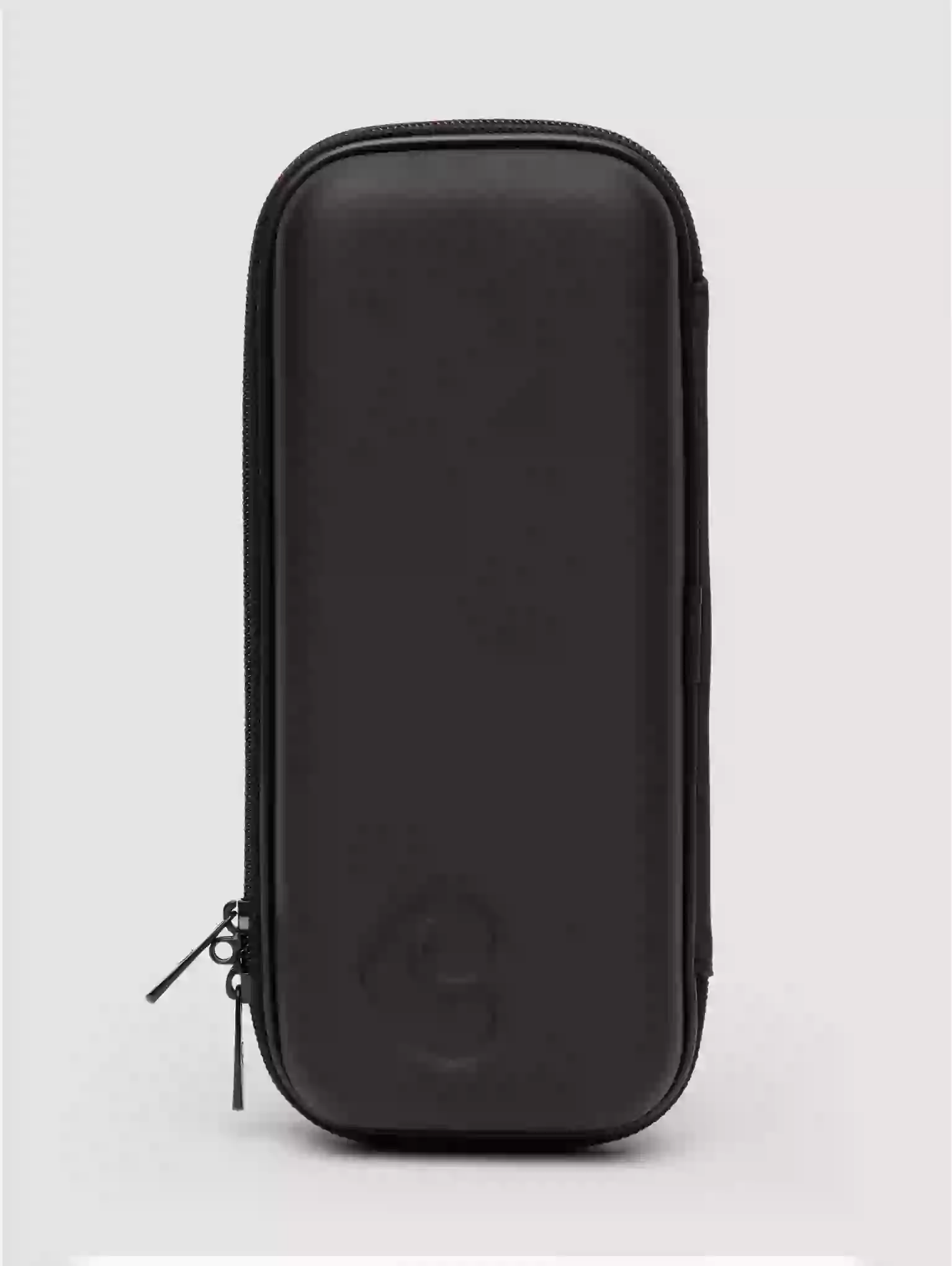 Black zippered case on a light gray background