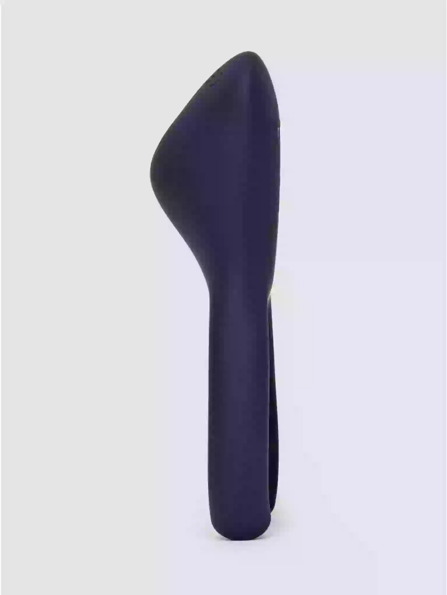 Black plastic object on a white background