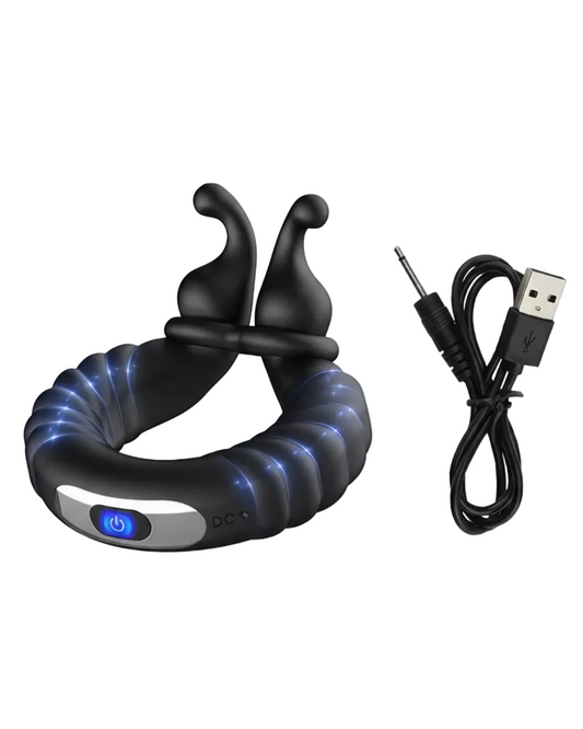 Black electronic device with blue lights and USB cable on a white background
