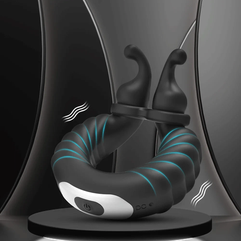 Black and gray electronic device with blue lights on a dark background