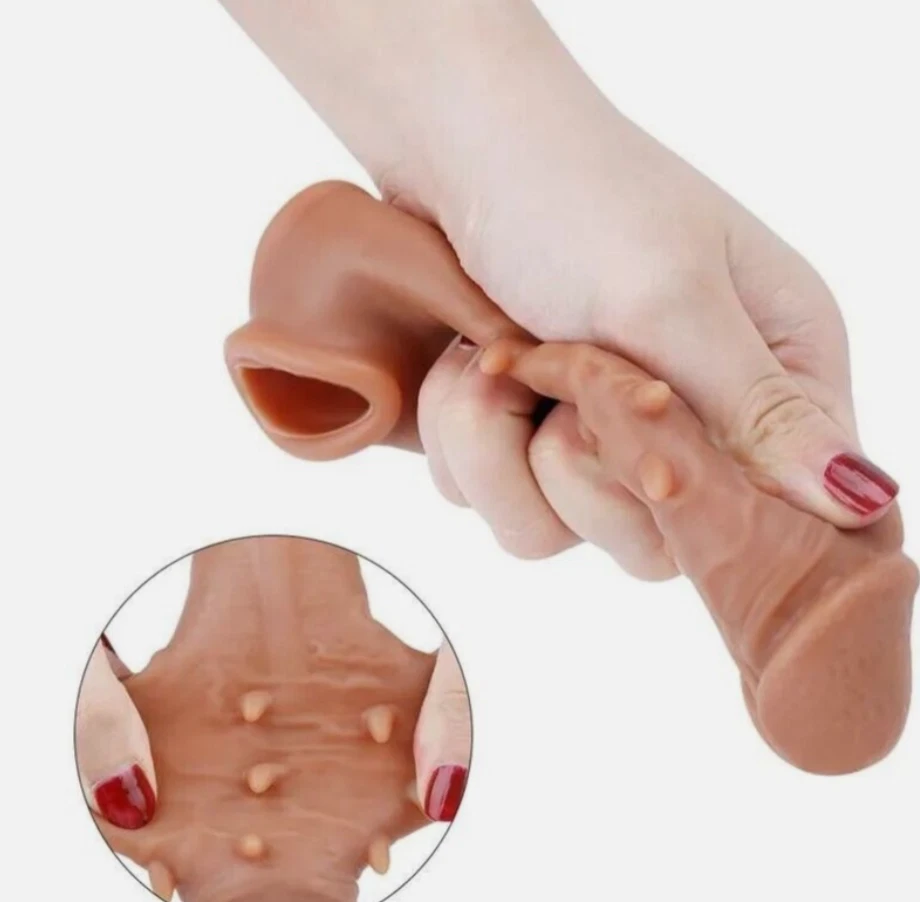 Silicone product with detailed texture held by a hand on a white background