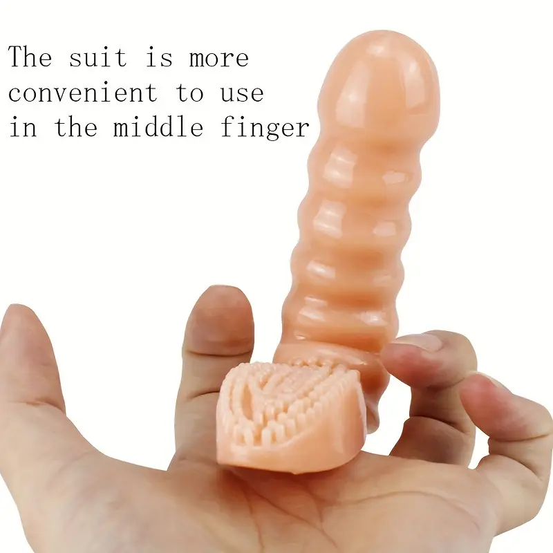 Silicone middle finger extension product held in a hand with text on a white background