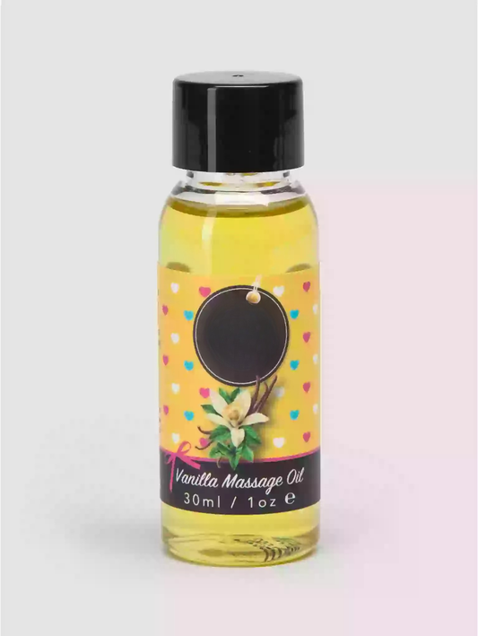 Bottle of vanilla massage oil with a colorful label on a light background