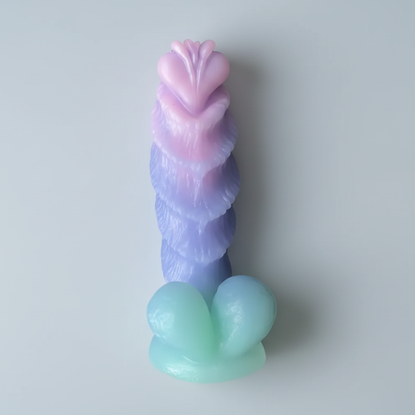 Pastel-colored silicone toy on a light gray background